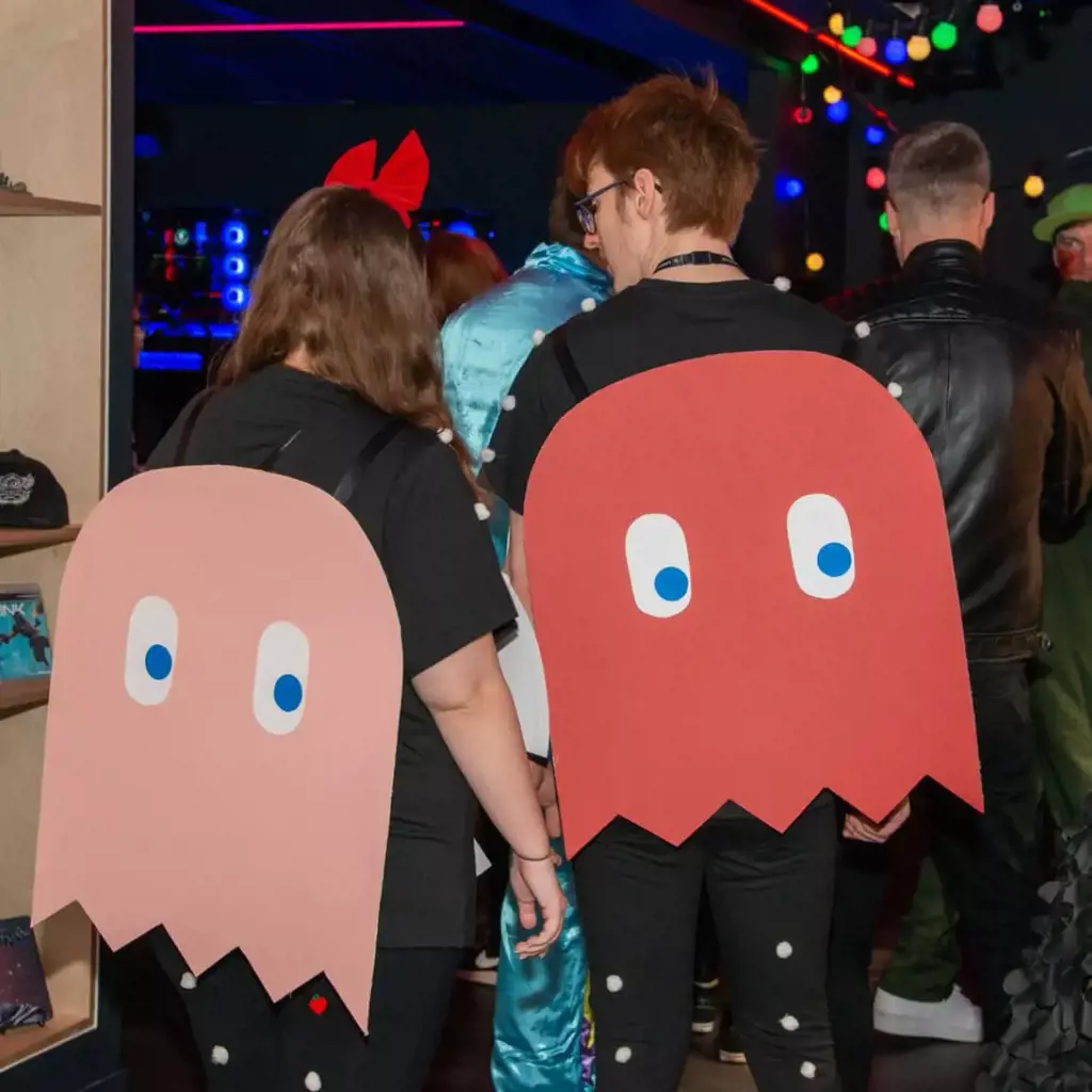Two Splash Damage team members dressed as ghosts from Pacman